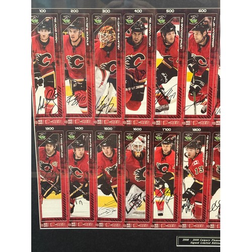 81 - Framed limited edition 2008-2009 Calgary Flames team autographs. frame size 20.5 by 29 inches