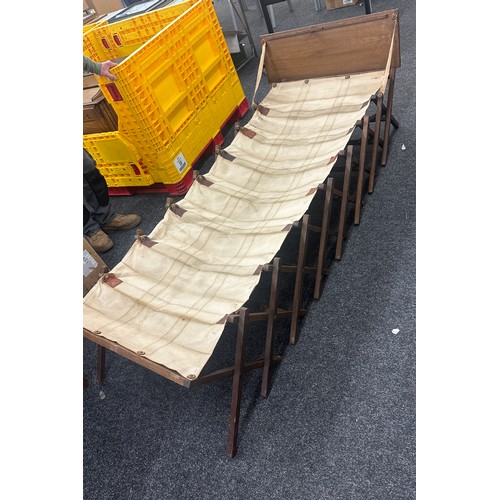 406 - Antique military campaign bed measures approximately 84 inches long x 23 wide x 25 tall