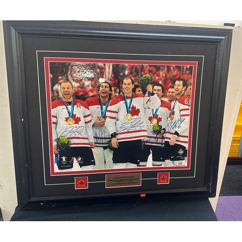 152 - Autographed Team Canada Gold from Vancouver olympic Games 2010, unfortunately damage has been sustai... 