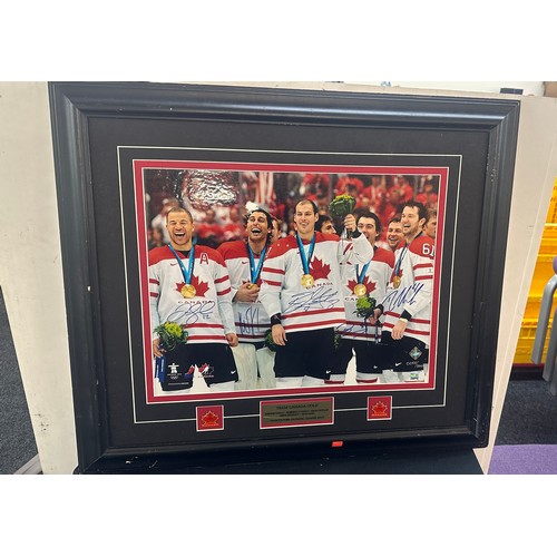 152 - Autographed Team Canada Gold from Vancouver olympic Games 2010, unfortunately damage has been sustai... 