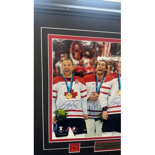 152 - Autographed Team Canada Gold from Vancouver olympic Games 2010, unfortunately damage has been sustai... 