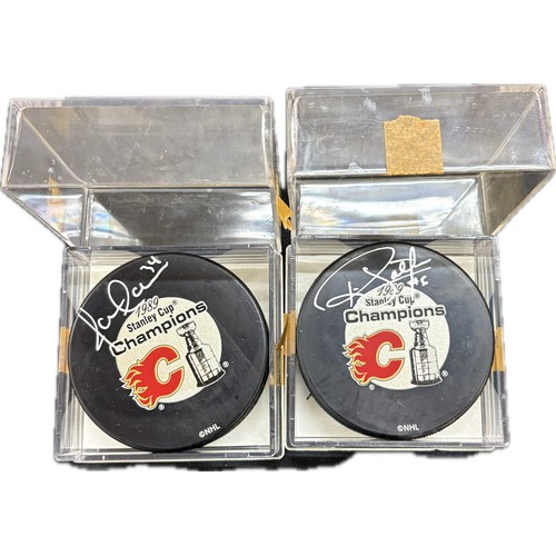 453 - Authentic Jamie Macoun and Ric Nattress signed Calgary Flames hockey puck 1989 Stanley cup champions... 