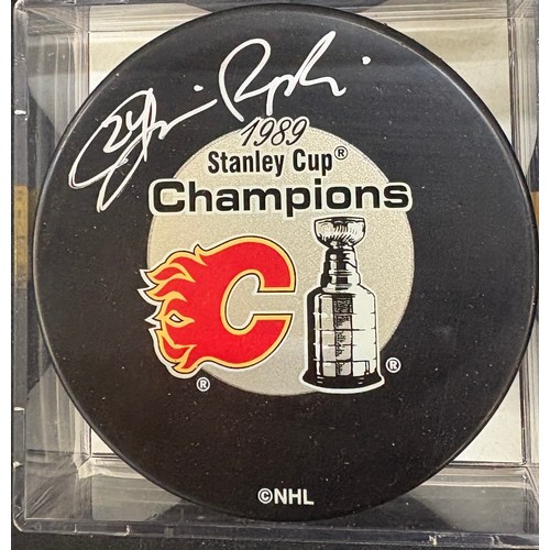 455 - Selection of 3 authentically signed Calgary Flames hockey puck 1989 Stanley cup champions with COA b... 