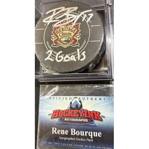 533 - 2011 heritage classic hockey puck signed by Jarome Iglina, Mark Giordano, Rene Bourque with HockeyIn... 