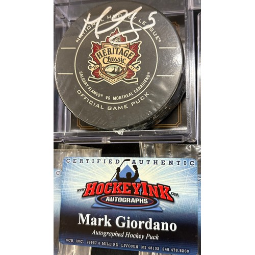 533 - 2011 heritage classic hockey puck signed by Jarome Iglina, Mark Giordano, Rene Bourque with HockeyIn... 