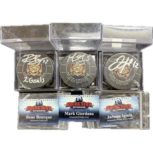 533 - 2011 heritage classic hockey puck signed by Jarome Iglina, Mark Giordano, Rene Bourque with HockeyIn... 