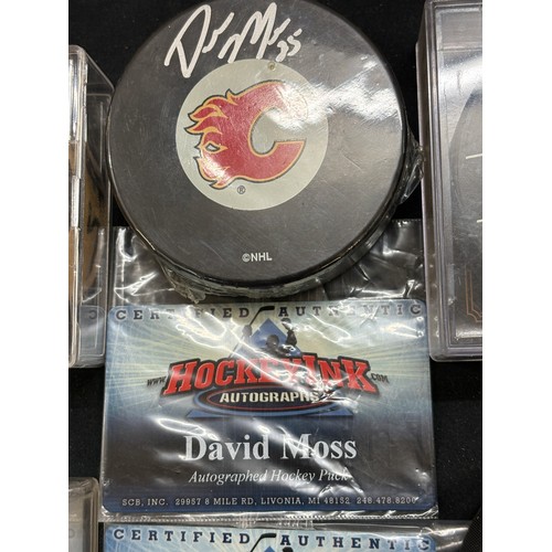 448 - Selection of 6 NHL pucks, 3 of which are signed by Calgarry Flames players, miikka kiprusoff, David ... 