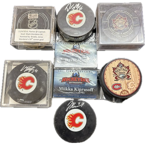 448 - Selection of 6 NHL pucks, 3 of which are signed by Calgarry Flames players, miikka kiprusoff, David ... 