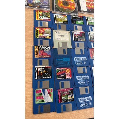 25 - Selection of vintage Amiga Power game cards to include Kids Chaos, Base Jumpers and other vintage pl... 