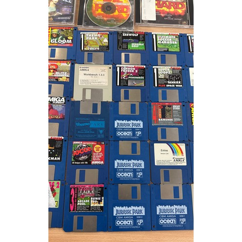 25 - Selection of vintage Amiga Power game cards to include Kids Chaos, Base Jumpers and other vintage pl... 