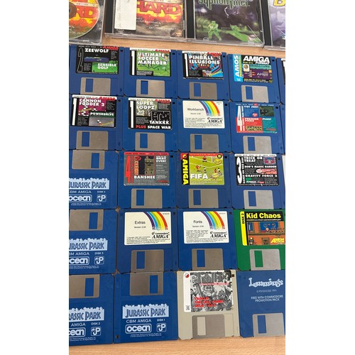 25 - Selection of vintage Amiga Power game cards to include Kids Chaos, Base Jumpers and other vintage pl... 