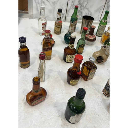 7 - Selection of miniature alcohols to include Smirnoff, Harveys, some empty