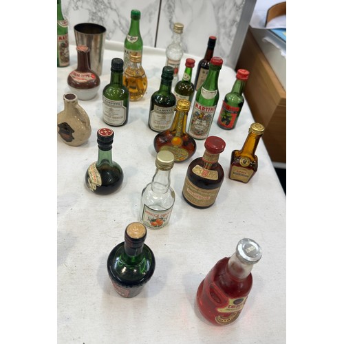 7 - Selection of miniature alcohols to include Smirnoff, Harveys, some empty