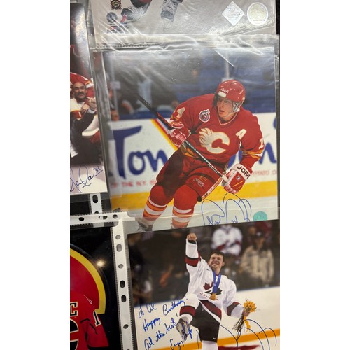 5 - Folder containing various authographed Hockey NFL platers, most with COA, to include players such as... 