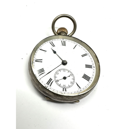 326 - Antique silver open face pocket watch the watch is ticking