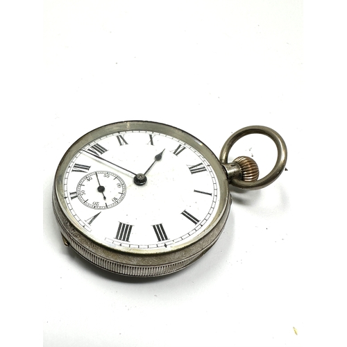 326 - Antique silver open face pocket watch the watch is ticking