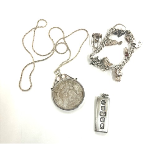 495 - Selection of silver jewellery includes Ingot, charm bracelet total weight 99grams