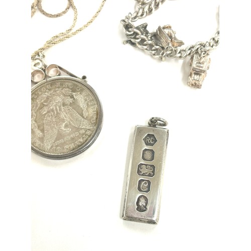 495 - Selection of silver jewellery includes Ingot, charm bracelet total weight 99grams