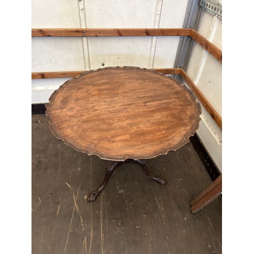 395 - Oak 3 leg tilt top table measures approx 28 inches tall x 33 deep