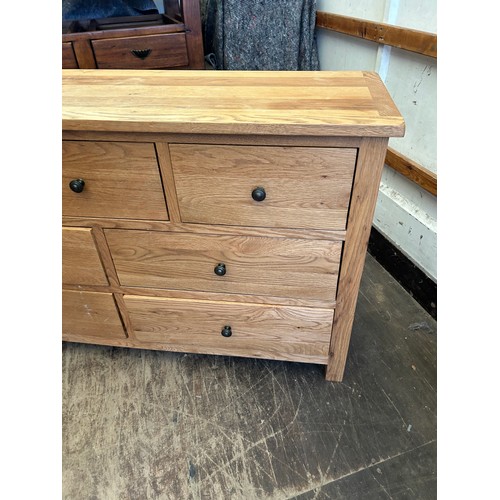 412 - Oak 7 drawer sideboard measures approx 51 inches wide x 16 deep and 31 tall