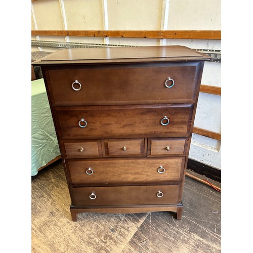 411 - Stag 7 drawer chest measures approximately 18 inches deep x 44 tall and 32 long