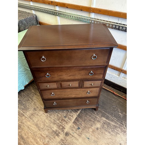 411 - Stag 7 drawer chest measures approximately 18 inches deep x 44 tall and 32 long