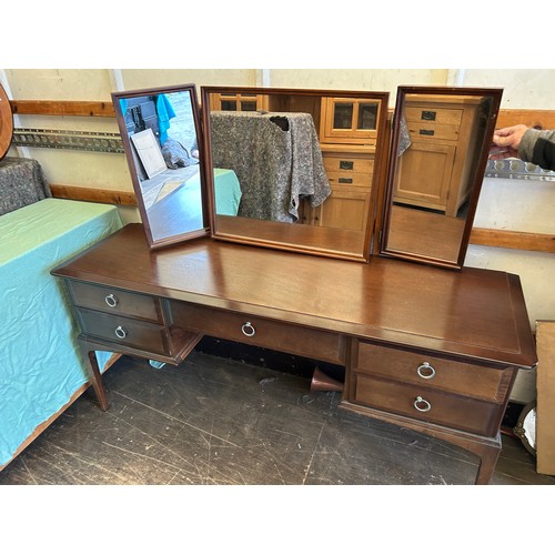 409 - Stag dressing table and stool, dressing table measures approximately 5ft in length, Depth 18 inches,... 