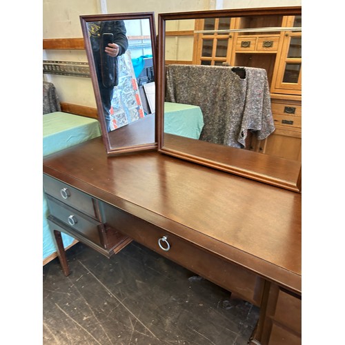 409 - Stag dressing table and stool, dressing table measures approximately 5ft in length, Depth 18 inches,... 