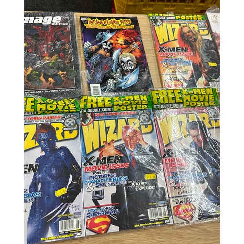 293 - Selection of assorted comics and magazines to include IDW, Wizard etc