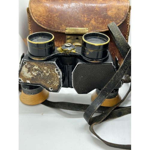 521 - Victorian rosewood tea caddy, binoculars and a silver mounted conductors baton