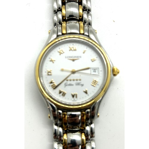 483 - Gentlemans Longines golden wing wristwatch in working order