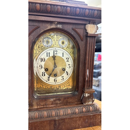 30 - Oak cased mantel clock in need of restoration measures approximately 18 inches tall x 13 wide and 9 ... 