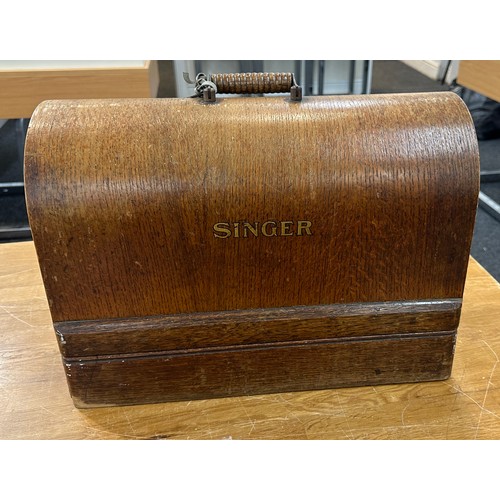 278 - Vintage cased Singer sewing machine with key