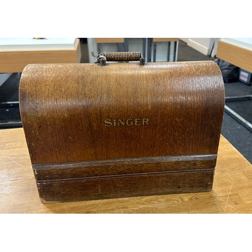 278 - Vintage cased Singer sewing machine with key