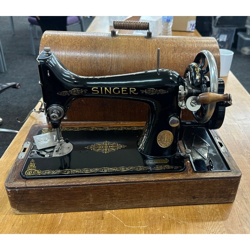 278 - Vintage cased Singer sewing machine with key