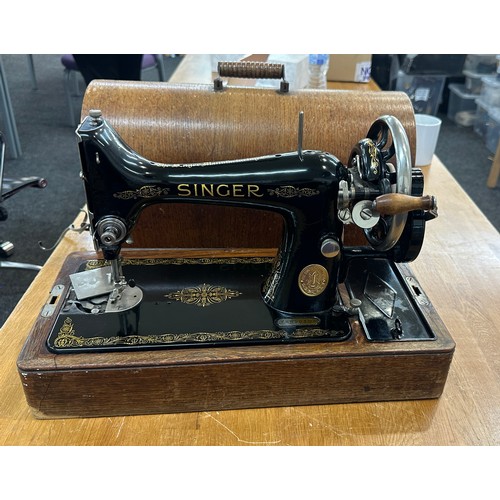 278 - Vintage cased Singer sewing machine with key