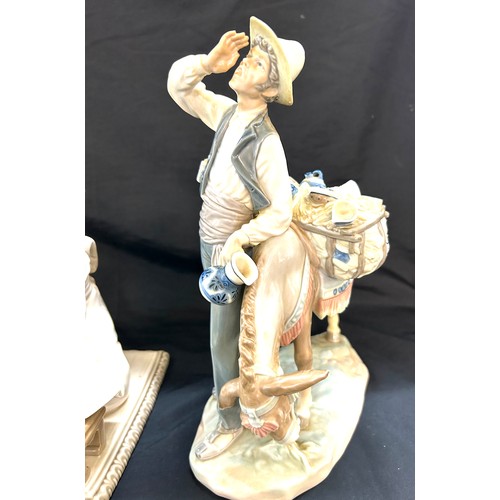 256 - Selection of Three Lladro figures includes Man with Donkey, oriental lady etc