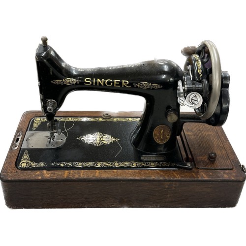 131 - Vintage cased singer sewing machine, untested