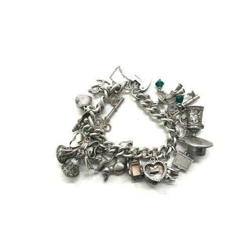 493 - Chunky silver charm bracelet total weight 83g