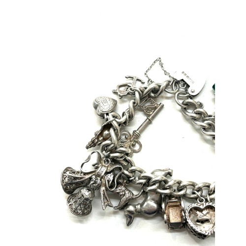 493 - Chunky silver charm bracelet total weight 83g