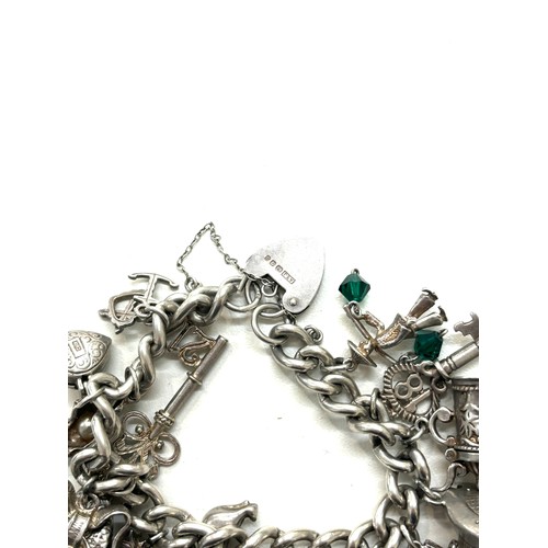 493 - Chunky silver charm bracelet total weight 83g