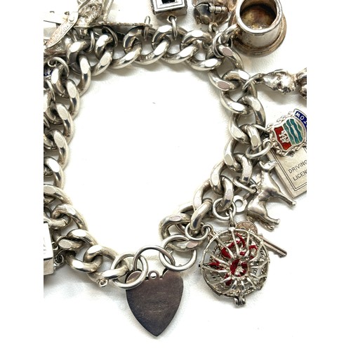 503 - Chunky silver charm bracelet total weight 136g