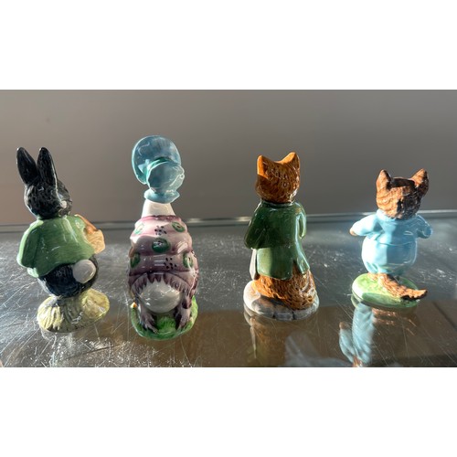 352 - Four Beswick Beatrice Potter ornaments to include ' Little Black Rabbit', ' Jemima Puddle duck', ' G... 