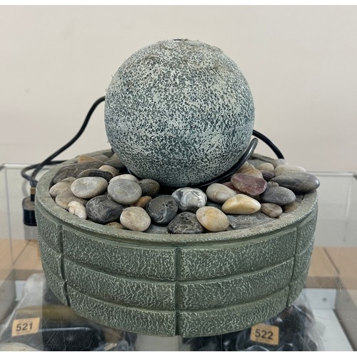 199 - Garden water fountain feature with stones measures approximately 11 inches tall x 10 diameter