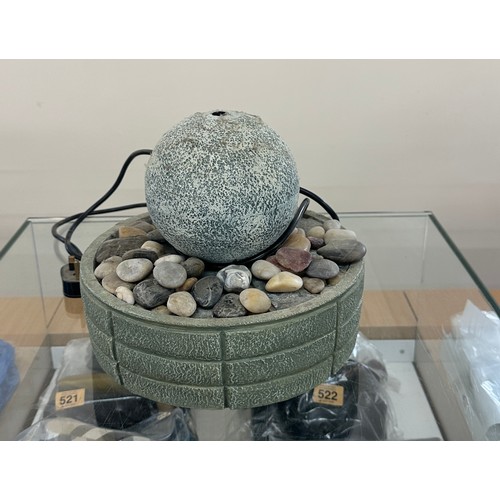 199 - Garden water fountain feature with stones measures approximately 11 inches tall x 10 diameter