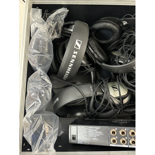 323 - Behringer Mini amp Model amp800 and a large selection of assorted head phones, all untested