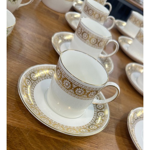 201 - Two part vintage tea services one Royal Doulton the other Wedgwood along with some soup bowls and sa... 