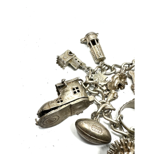 257 - Vintage silver charm bracelet and charms weight 72g