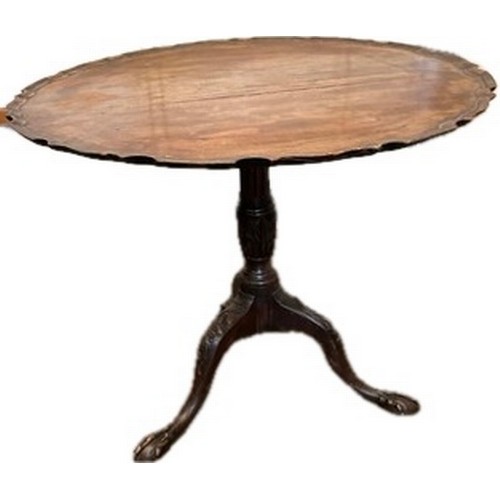 395 - Oak 3 leg tilt top table measures approx 28 inches tall x 33 deep