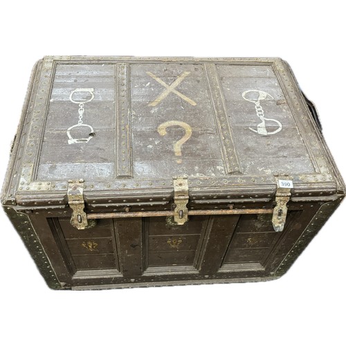 390 - Antique escapology trunk on casters with chains, measures approximately 29 inches tall 38 inches wid... 